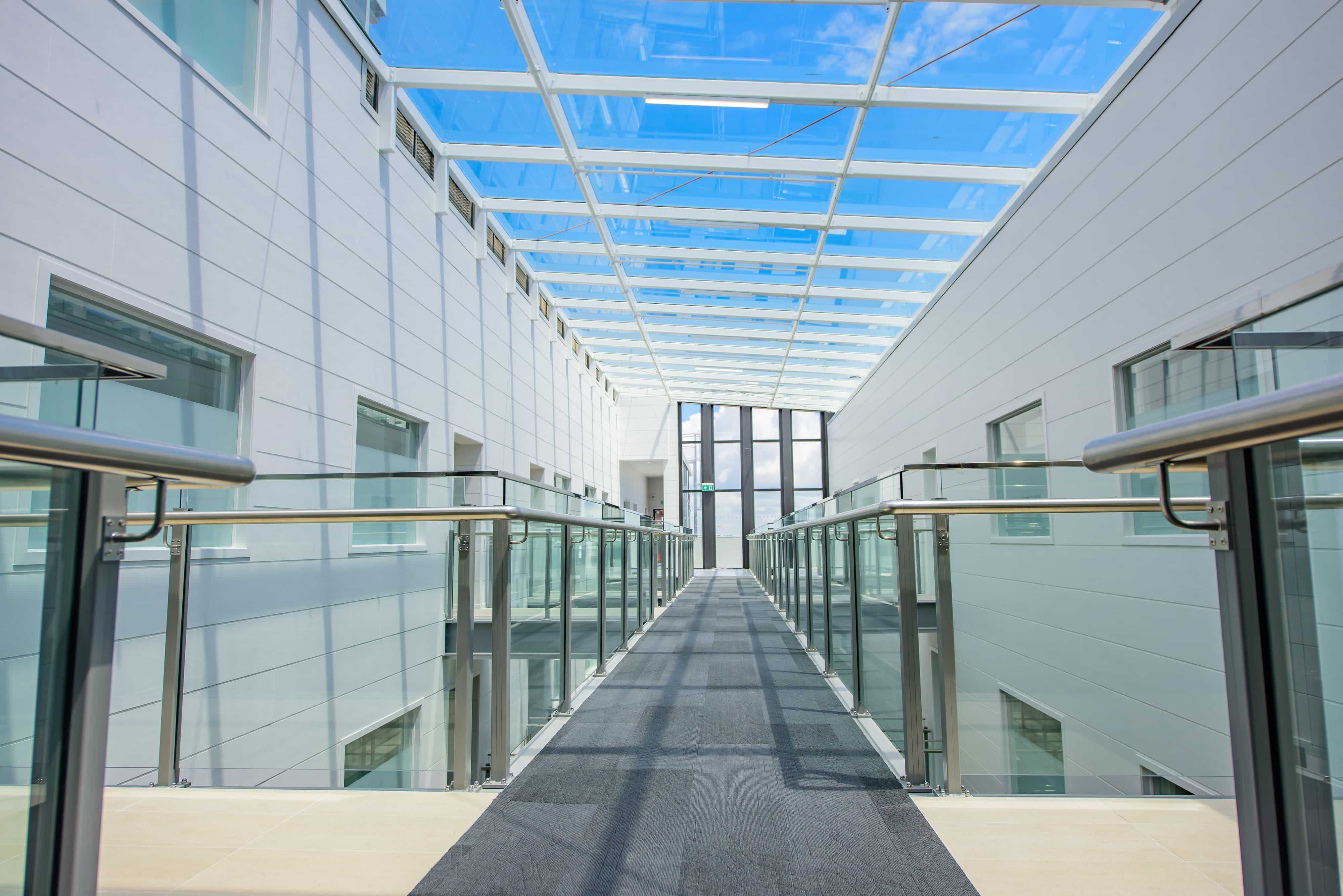 Stainless Steel & Aluminum Alloy Fusion: Integrated Glass Canopies and C5-Grade Commercial Railings